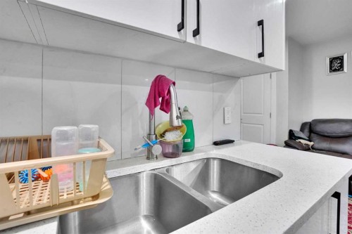14 Belvedere Common Se, Calgary, AB - Indoor Photo Showing Kitchen With Double Sink