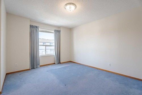 203 Anderson Grove Sw, Calgary, AB - Indoor Photo Showing Other Room