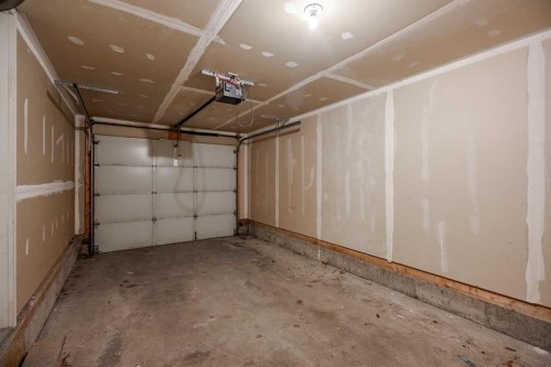 203 Anderson Grove Sw, Calgary, AB - Indoor Photo Showing Garage
