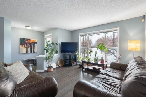 176 Prestwick Heights Se, Calgary, AB - Indoor Photo Showing Living Room