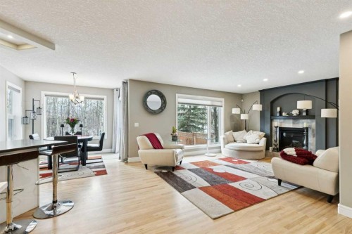 810 Wentworth Place Sw, Calgary, AB - Indoor Photo Showing Living Room With Fireplace