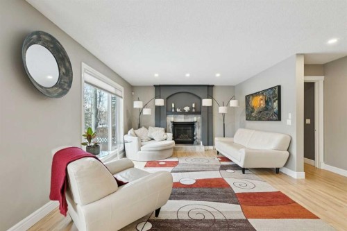 810 Wentworth Place Sw, Calgary, AB - Indoor Photo Showing Living Room With Fireplace