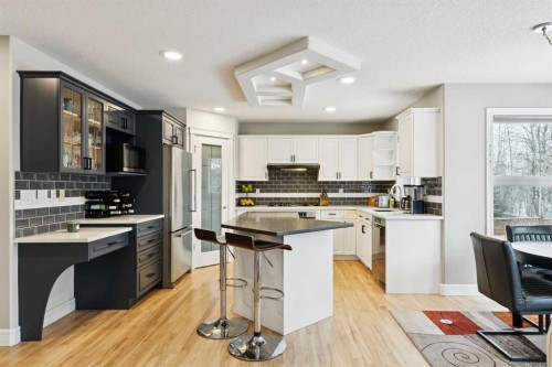 810 Wentworth Place Sw, Calgary, AB - Indoor Photo Showing Kitchen With Double Sink With Upgraded Kitchen