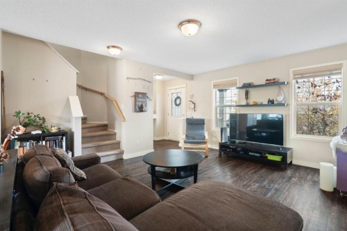 284 Copperfield Heights Se, Calgary, AB - Indoor Photo Showing Living Room