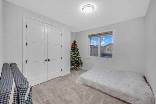 95 Saddlepeace Way Ne, Calgary, AB - Indoor Photo Showing Bedroom