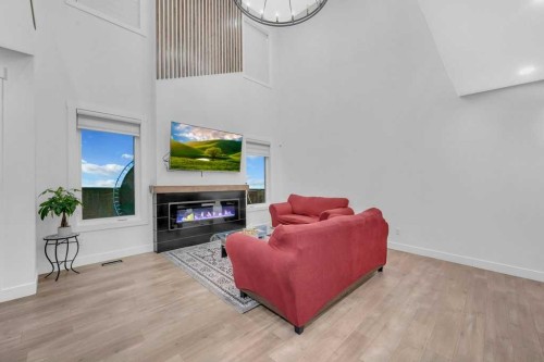 95 Saddlepeace Way Ne, Calgary, AB - Indoor With Fireplace