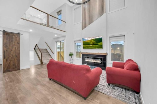 95 Saddlepeace Way Ne, Calgary, AB - Indoor Photo Showing Living Room With Fireplace