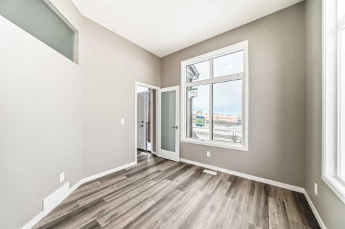 155 Sawgrass Gate Nw, Airdrie, AB - Indoor Photo Showing Other Room