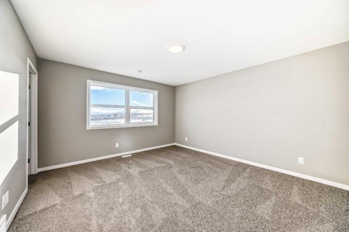 155 Sawgrass Gate Nw, Airdrie, AB - Indoor Photo Showing Other Room