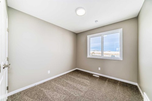 155 Sawgrass Gate Nw, Airdrie, AB - Indoor Photo Showing Other Room