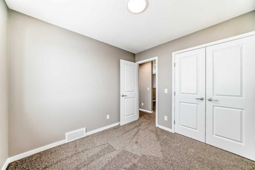 155 Sawgrass Gate Nw, Airdrie, AB - Indoor Photo Showing Other Room
