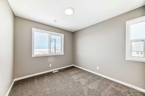 155 Sawgrass Gate Nw, Airdrie, AB - Indoor Photo Showing Other Room