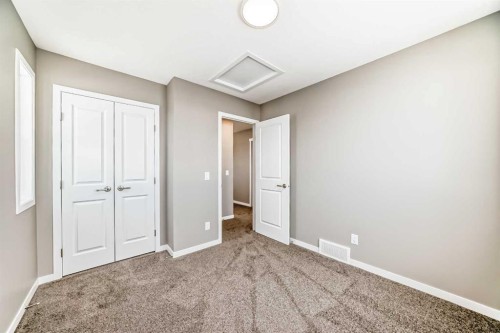 155 Sawgrass Gate Nw, Airdrie, AB - Indoor Photo Showing Other Room