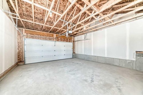 155 Sawgrass Gate Nw, Airdrie, AB - Indoor Photo Showing Garage