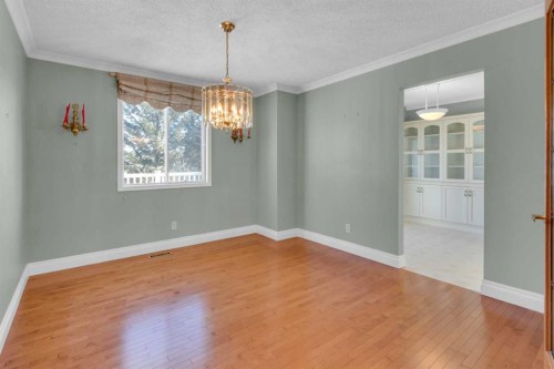 12 Vandoos Villas Nw, Calgary, AB - Indoor Photo Showing Other Room