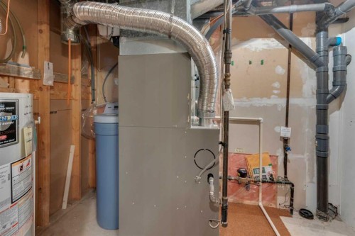 12 Vandoos Villas Nw, Calgary, AB - Indoor Photo Showing Basement