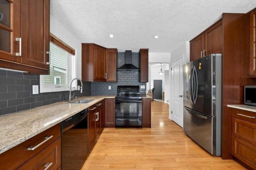22 Shawinigan Rise Sw, Calgary, AB - Indoor Photo Showing Kitchen With Stainless Steel Kitchen