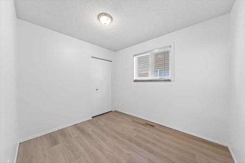 22 Shawinigan Rise Sw, Calgary, AB - Indoor Photo Showing Other Room