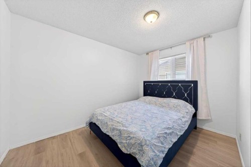 22 Shawinigan Rise Sw, Calgary, AB - Indoor Photo Showing Bedroom