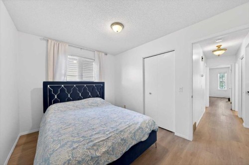 22 Shawinigan Rise Sw, Calgary, AB - Indoor Photo Showing Bedroom