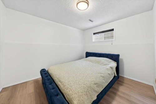 22 Shawinigan Rise Sw, Calgary, AB - Indoor Photo Showing Bedroom