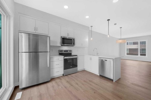 305 Shawnee Square Sw, Calgary, AB - Indoor Photo Showing Kitchen With Stainless Steel Kitchen With Upgraded Kitchen