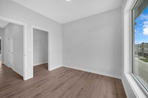 305 Shawnee Square Sw, Calgary, AB - Indoor Photo Showing Other Room
