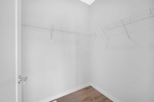 305 Shawnee Square Sw, Calgary, AB - Indoor With Storage