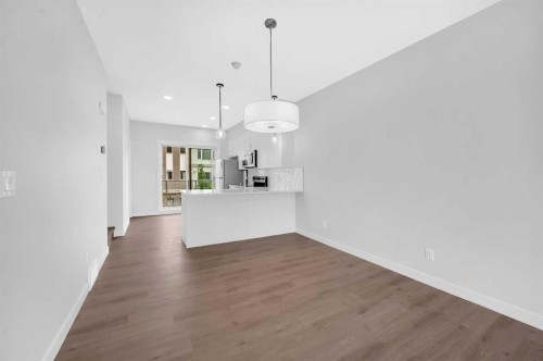 305 Shawnee Square Sw, Calgary, AB - Indoor Photo Showing Kitchen