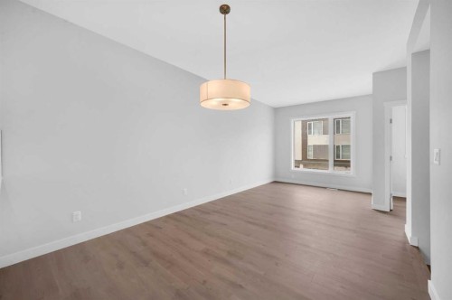 305 Shawnee Square Sw, Calgary, AB - Indoor Photo Showing Other Room