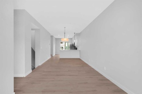 305 Shawnee Square Sw, Calgary, AB - Indoor Photo Showing Other Room