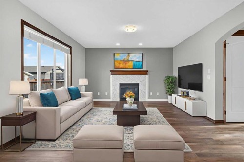 4358 Elgin Avenue Se, Calgary, AB - Indoor Photo Showing Living Room With Fireplace