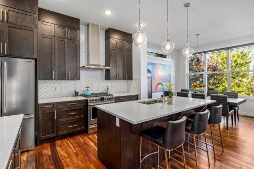 10 Cranbrook Hill Se, Calgary, AB - Indoor Photo Showing Kitchen With Double Sink With Upgraded Kitchen