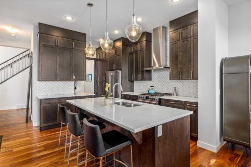 10 Cranbrook Hill Se, Calgary, AB - Indoor Photo Showing Kitchen With Double Sink With Upgraded Kitchen