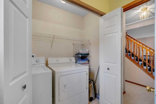 9526 21 Street Se, Calgary, AB - Indoor Photo Showing Laundry Room