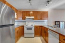 9526 21 Street Se, Calgary, AB  - Indoor Photo Showing Kitchen With Double Sink 