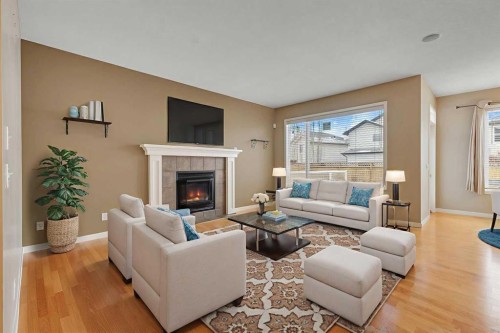 119 Valley Stream Circle Nw, Calgary, AB - Indoor Photo Showing Living Room With Fireplace