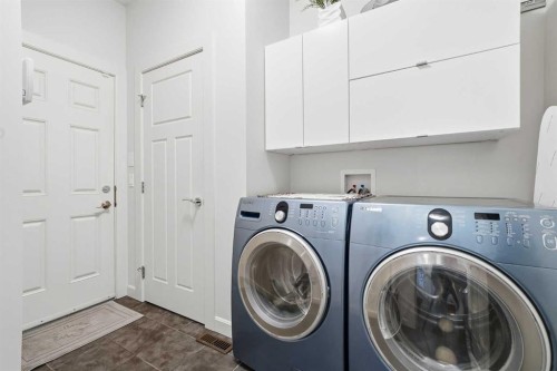 65 Sage Hill Landing Nw, Calgary, AB - Indoor Photo Showing Laundry Room