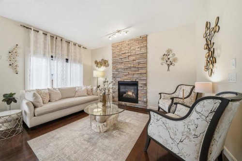 65 Sage Hill Landing Nw, Calgary, AB - Indoor Photo Showing Living Room With Fireplace