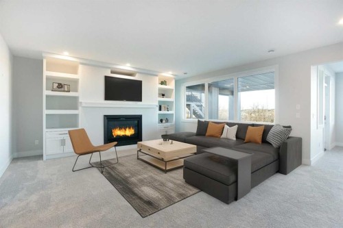 74 Cimarron Estates Drive, Okotoks, AB - Indoor Photo Showing Living Room With Fireplace