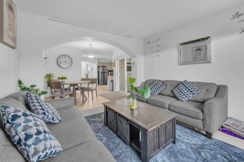 144 Saddlecrest Place Ne, Calgary, AB - Indoor Photo Showing Living Room