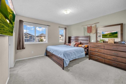 144 Saddlecrest Place Ne, Calgary, AB - Indoor Photo Showing Bedroom
