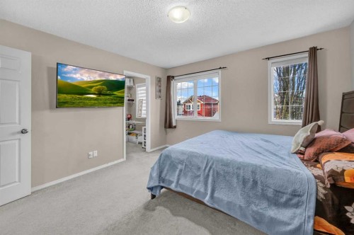 144 Saddlecrest Place Ne, Calgary, AB - Indoor Photo Showing Bedroom