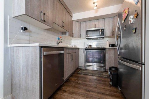 3217-6118 80 Avenue Ne, Calgary, AB - Indoor Photo Showing Kitchen With Upgraded Kitchen