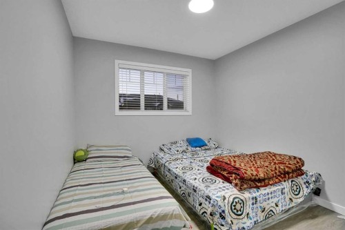 257 Saddlebrook Point Ne, Calgary, AB - Indoor Photo Showing Bedroom