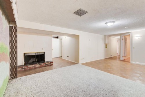 10211 5 Street Se, Calgary, AB - Indoor With Fireplace