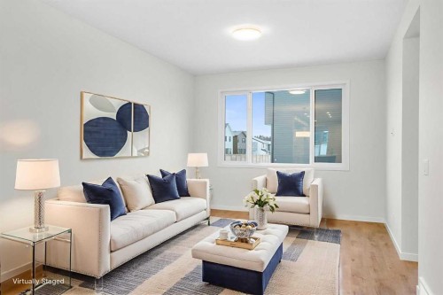 107 Royston Way Nw, Calgary, AB - Indoor Photo Showing Living Room