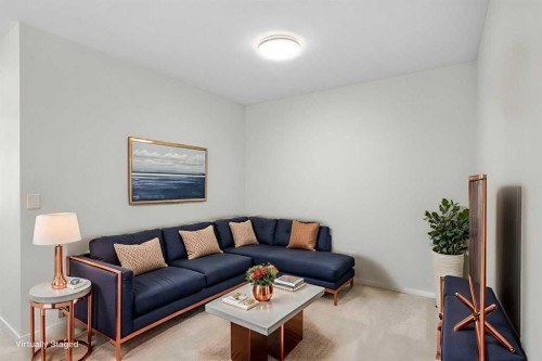 107 Royston Way Nw, Calgary, AB - Indoor Photo Showing Living Room