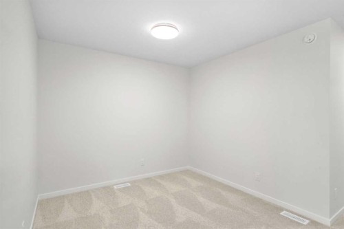 107 Royston Way Nw, Calgary, AB - Indoor Photo Showing Other Room