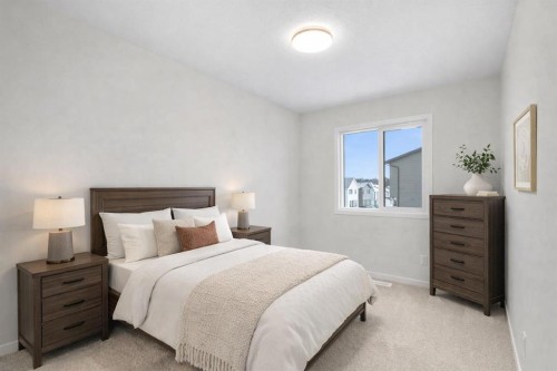 107 Royston Way Nw, Calgary, AB - Indoor Photo Showing Bedroom